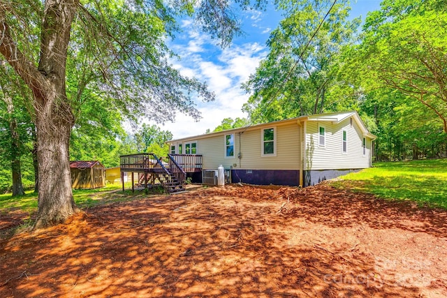 1224 Martin Rd, Hickory Grove, SC 29717 - back of property featuring a deck, stairway, crawl space, and central AC unit