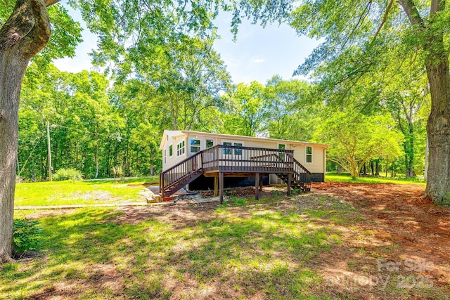 1224 Martin Rd, Hickory Grove, SC 29717 - rear view of house featuring stairs, a wooden deck, a lawn, and a view of trees
