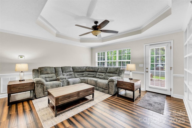 2005 Schofield Pl, Salisbury, NC 28144 - living room with a raised ceiling, crown molding, a ceiling fan, and hardwood / wood-style floors