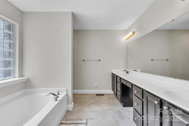 2005 Schofield Pl, Salisbury, NC 28144 - full bath featuring double vanity, a bath, and baseboards