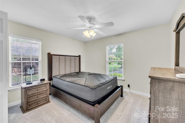 2005 Schofield Pl, Salisbury, NC 28144 - bedroom with light carpet, baseboards, and ceiling fan
