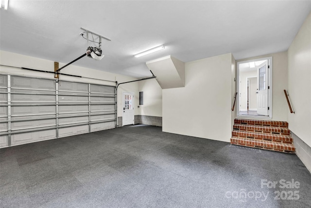 2005 Schofield Pl, Salisbury, NC 28144 - garage featuring a garage door opener and electric panel