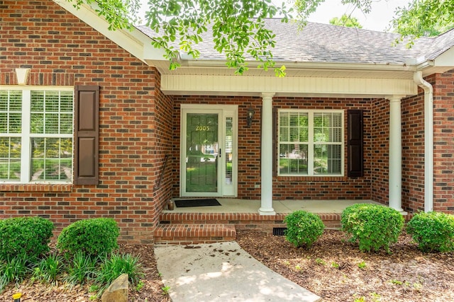 2005 Schofield Pl, Salisbury, NC 28144 - entrance to property featuring a porch, brick siding, and roof with shingles