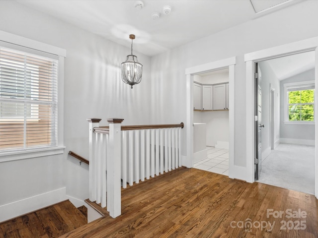 807 Herrons Ferry Rd, Rock Hill, SC 29730 - hall with an upstairs landing, wood finished floors, a chandelier, and baseboards
