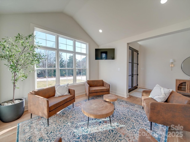 8039 Mcconnell Rd, Denver, NC 28037 - living area featuring light wood-style floors, lofted ceiling, baseboards, recessed lighting, and french doors
