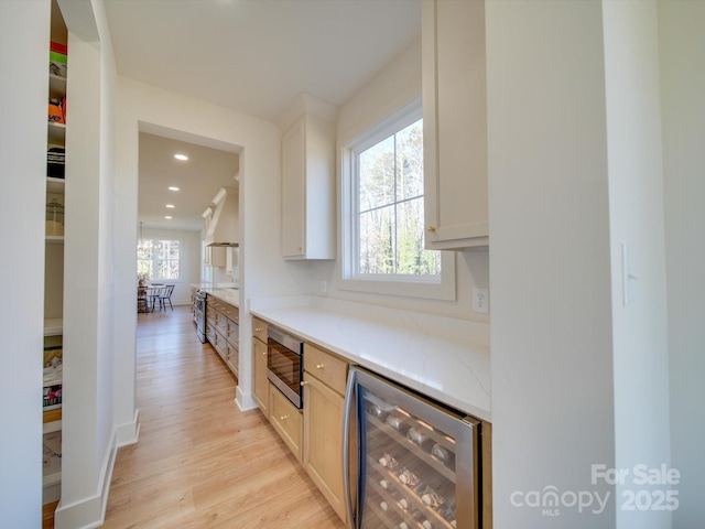 8039 Mcconnell Rd, Denver, NC 28037 - indoor dry bar featuring wine cooler, stainless steel microwave, healthy amount of natural light, light wood-style floors, and recessed lighting