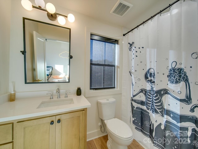 8039 Mcconnell Rd, Denver, NC 28037 - full bathroom featuring toilet, vanity, wood finished floors, and a shower with shower curtain