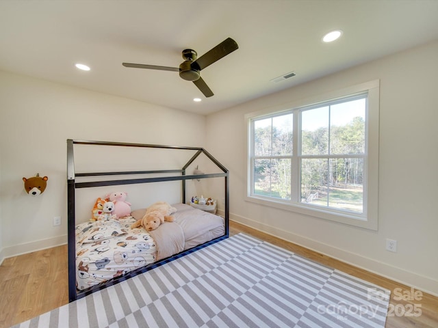 8039 Mcconnell Rd, Denver, NC 28037 - bedroom featuring wood finished floors, baseboards, recessed lighting, and a ceiling fan