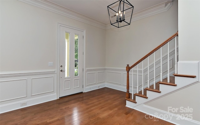 17210 Sulky Plough Rd Unit 1206, Charlotte, NC 28277 - entrance foyer featuring stairs, a chandelier, crown molding, a decorative wall, and wood finished floors