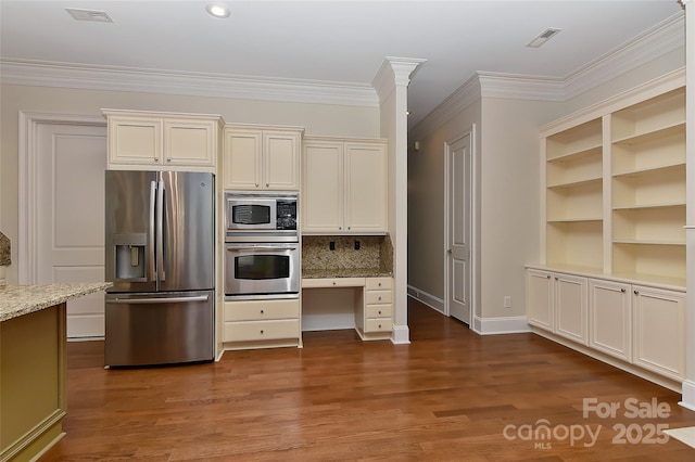 17210 Sulky Plough Rd Unit 1206, Charlotte, NC 28277 - kitchen featuring appliances with stainless steel finishes, light stone counters, dark wood-style flooring, baseboards, and crown molding
