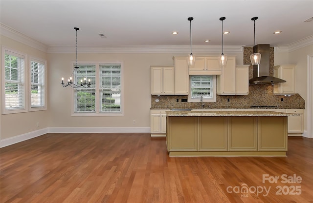 17210 Sulky Plough Rd Unit 1206, Charlotte, NC 28277 - kitchen featuring wall chimney exhaust hood, wood finished floors, a chandelier, healthy amount of natural light, and crown molding