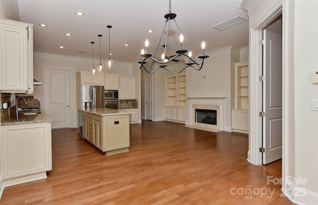 17210 Sulky Plough Rd Unit 1206, Charlotte, NC 28277 - kitchen with ornamental molding, stainless steel appliances, a sink, light stone counters, and decorative backsplash