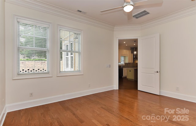 17210 Sulky Plough Rd Unit 1206, Charlotte, NC 28277 - empty room with ceiling fan, wood finished floors, baseboards, and crown molding