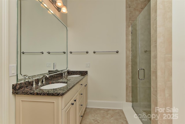 17210 Sulky Plough Rd Unit 1206, Charlotte, NC 28277 - full bathroom with double vanity, a stall shower, tile patterned floors, and baseboards