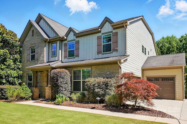 3808 Halcyon Dr, Huntersville, NC 28078 - craftsman house featuring board and batten siding, driveway, a front yard, a garage, and a shingled roof