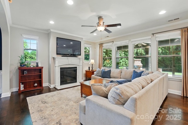 3808 Halcyon Dr, Huntersville, NC 28078 - living area featuring ceiling fan, dark wood-style flooring, a fireplace, recessed lighting, and baseboards