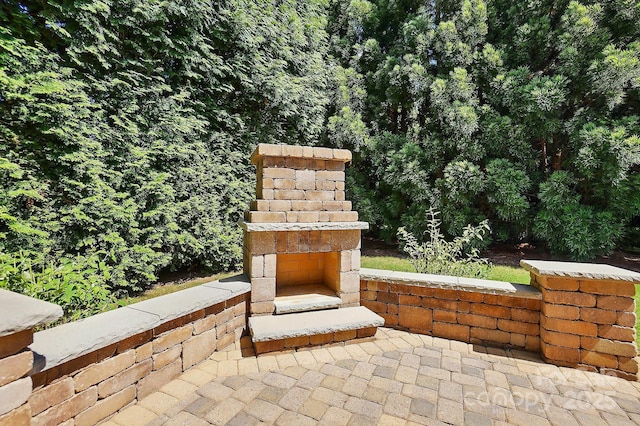 3808 Halcyon Dr, Huntersville, NC 28078 - view of patio / terrace featuring an outdoor stone fireplace