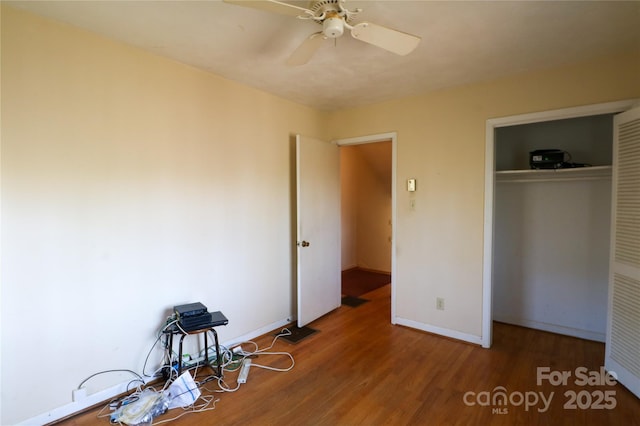 170 Heritage Ln, Salisbury, NC 28147 - unfurnished bedroom featuring a closet, wood finished floors, baseboards, and ceiling fan