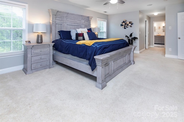 6914 Evanton Loch Rd, Charlotte, NC 28278 - bedroom featuring light carpet, baseboards, and multiple windows