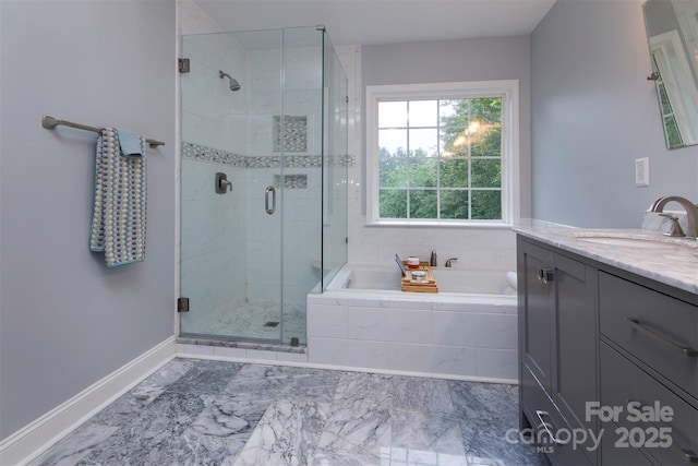 6914 Evanton Loch Rd, Charlotte, NC 28278 - full bath featuring a bath, vanity, a stall shower, baseboards, and marble look tiles