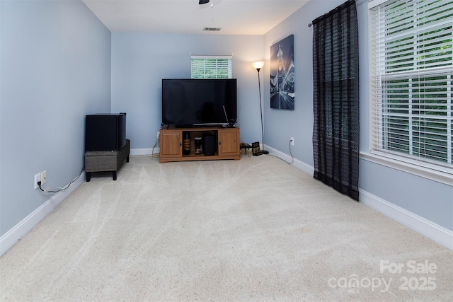 6914 Evanton Loch Rd, Charlotte, NC 28278 - carpeted living area featuring baseboards