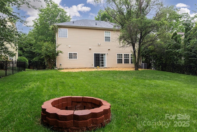 6914 Evanton Loch Rd, Charlotte, NC 28278 - rear view of property featuring a fire pit and central AC unit