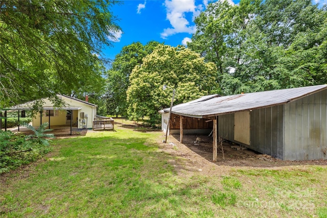 208 Lipe Rd, Troutman, NC 28166 - view of green lawn with an outdoor structure and an outbuilding