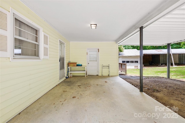 208 Lipe Rd, Troutman, NC 28166 - view of patio / terrace with an attached carport