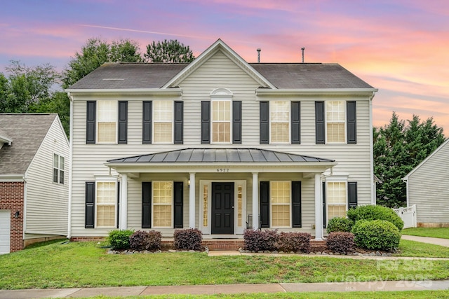 6922 Cascade Dream Ct, Huntersville, NC 28078 - colonial inspired home featuring a porch, a standing seam roof, and metal roof