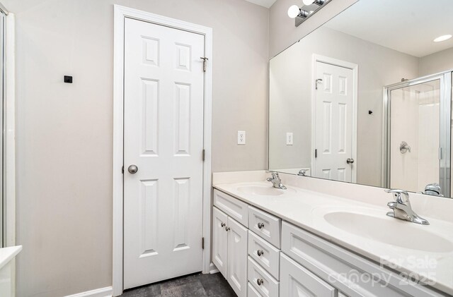 6922 Cascade Dream Ct, Huntersville, NC 28078 - bathroom with double vanity and a stall shower
