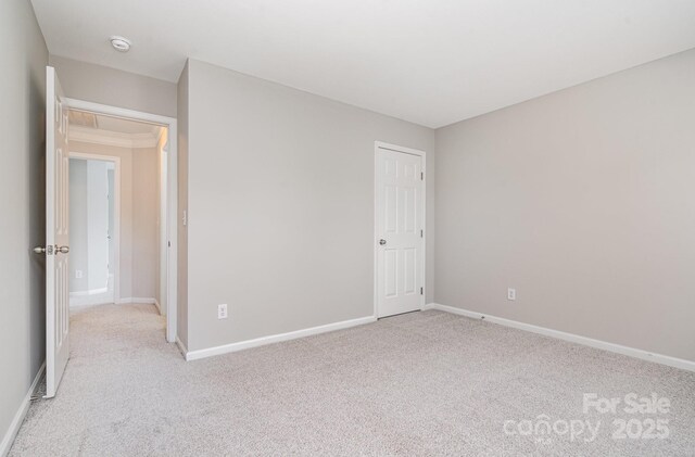 6922 Cascade Dream Ct, Huntersville, NC 28078 - unfurnished bedroom featuring light carpet and baseboards