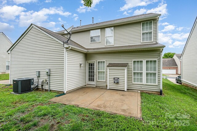 6922 Cascade Dream Ct, Huntersville, NC 28078 - back of property with central air condition unit, a yard, and a patio area