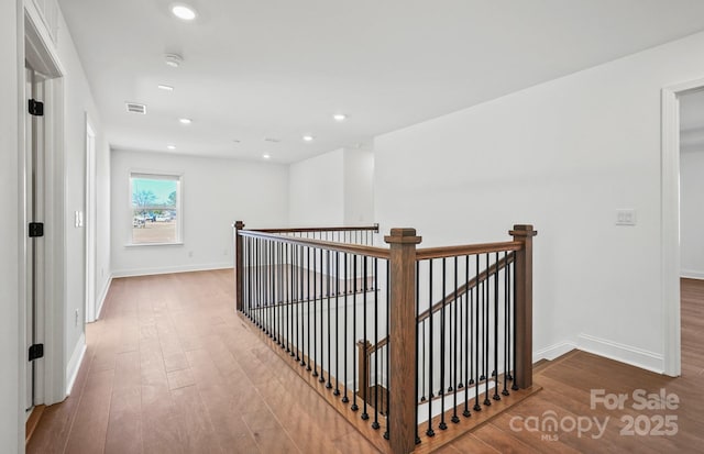 1048 Waxhaw Crossing Dr Unit 261, Waxhaw, NC 28173 - corridor with an upstairs landing, wood finished floors, baseboards, and recessed lighting