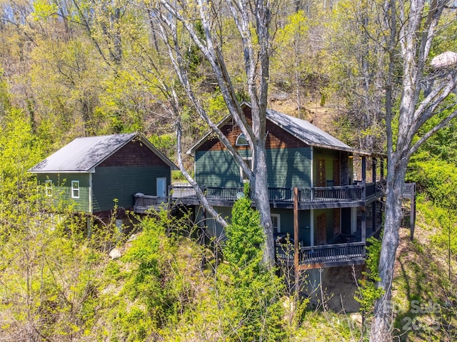 315 Black Bear Xing, Bryson City, NC 28713 - view of side of home featuring a deck and a wooded view