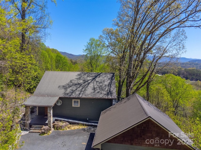 315 Black Bear Xing, Bryson City, NC 28713 - view of side of home with metal roof, a mountain view, and a wooded view