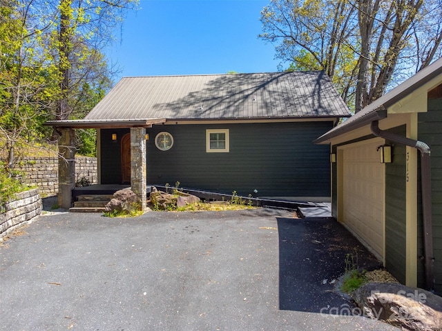 315 Black Bear Xing, Bryson City, NC 28713 - view of front of house with driveway, metal roof, and an attached garage