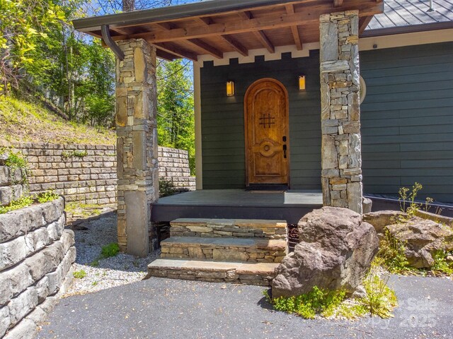 315 Black Bear Xing, Bryson City, NC 28713 - entrance to property featuring a standing seam roof, covered porch, and metal roof