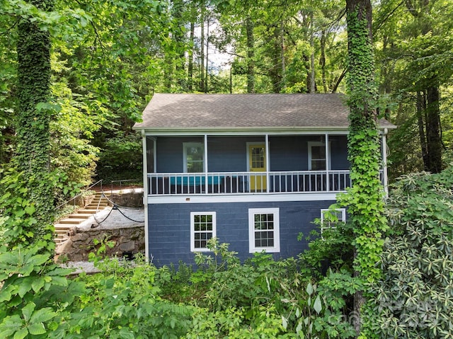 194 Mark Twain Dr, Lake Lure, NC 28743 - view of front of property featuring stairs and a shingled roof