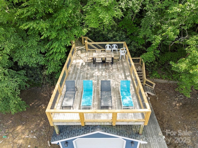 194 Mark Twain Dr, Lake Lure, NC 28743 - rear view of house with outdoor dining space and a deck