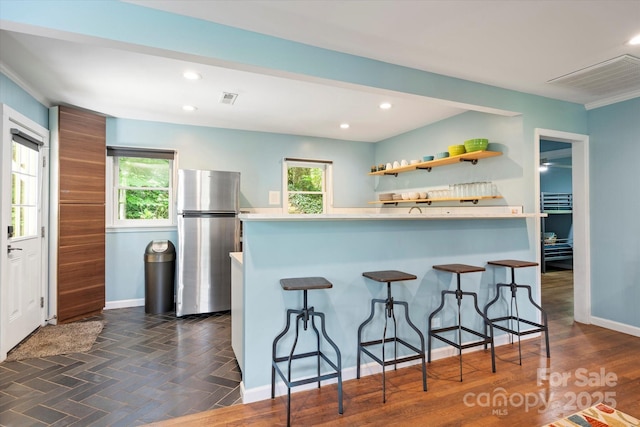 194 Mark Twain Dr, Lake Lure, NC 28743 - kitchen with freestanding refrigerator, healthy amount of natural light, light countertops, and recessed lighting