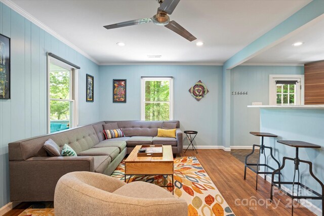 194 Mark Twain Dr, Lake Lure, NC 28743 - living room with ornamental molding, healthy amount of natural light, wood finished floors, a ceiling fan, and recessed lighting