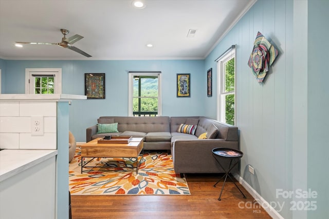 194 Mark Twain Dr, Lake Lure, NC 28743 - living area with crown molding, plenty of natural light, wood finished floors, ceiling fan, and recessed lighting