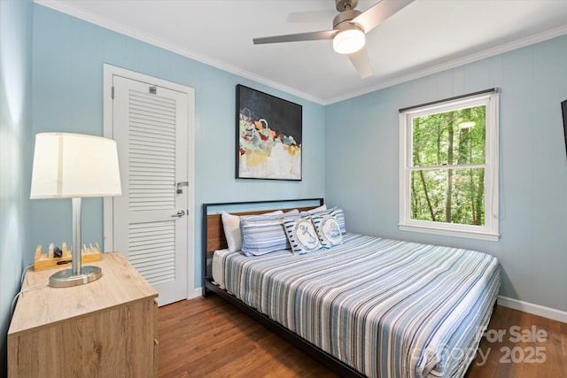 194 Mark Twain Dr, Lake Lure, NC 28743 - bedroom featuring crown molding, dark wood finished floors, baseboards, and ceiling fan