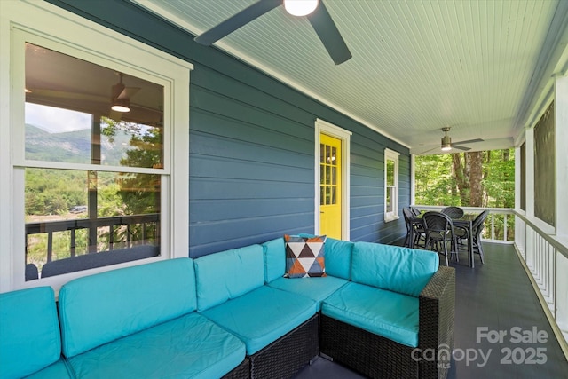 194 Mark Twain Dr, Lake Lure, NC 28743 - porch featuring a ceiling fan, outdoor lounge area, and outdoor dining space