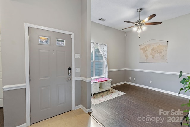 1310 Bellhook Pl NW, Concord, NC 28027 - entryway featuring ceiling fan, baseboards, and wood finished floors