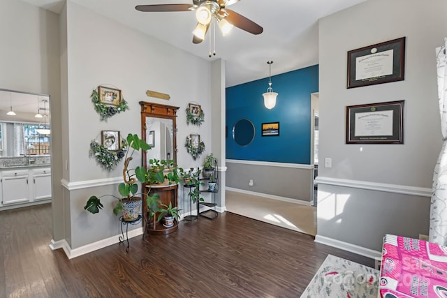 1310 Bellhook Pl NW, Concord, NC 28027 - foyer featuring a ceiling fan, dark wood-style floors, and baseboards