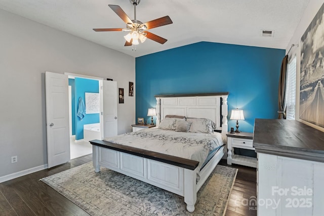 1310 Bellhook Pl NW, Concord, NC 28027 - bedroom featuring lofted ceiling, dark wood-style floors, baseboards, a ceiling fan, and ensuite bath