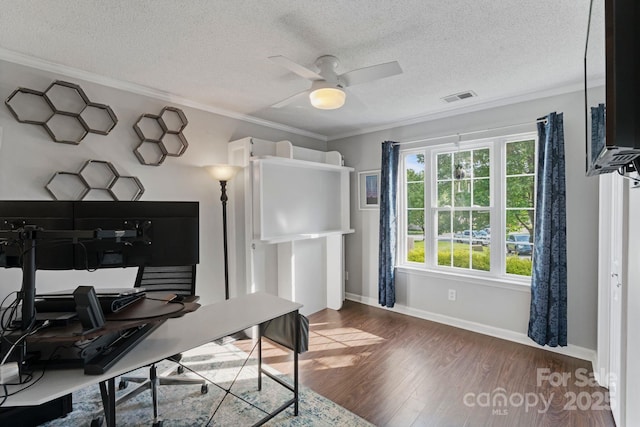1310 Bellhook Pl NW, Concord, NC 28027 - office area featuring crown molding, wood finished floors, ceiling fan, baseboards, and a textured ceiling