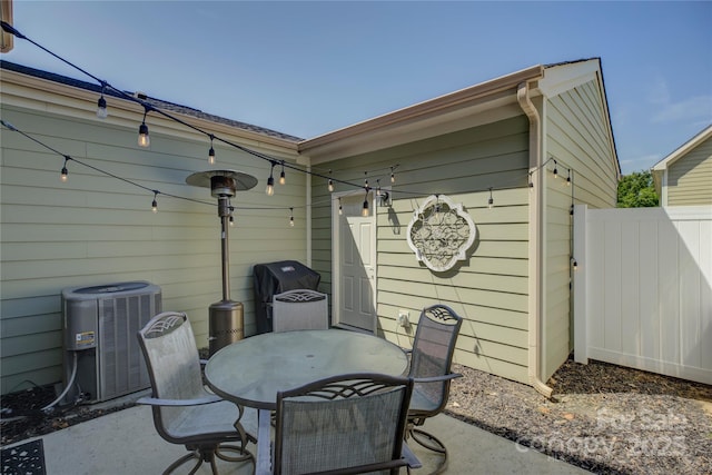 1225 Assembly St, Belmont, NC 28012 - view of patio / terrace with central AC and outdoor dining area