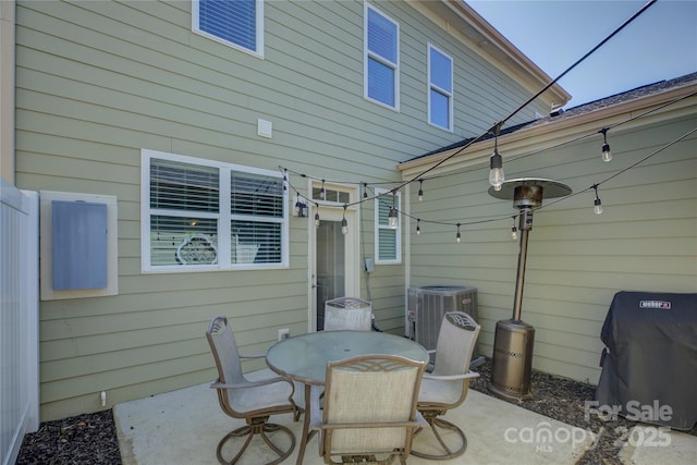 1225 Assembly St, Belmont, NC 28012 - view of patio / terrace featuring a grill, outdoor dining space, and central AC